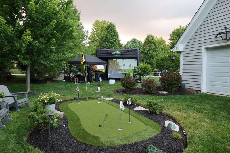 Golf 'n Go mobile golf simulator set up at a Chicagoland event — play Torrey Pines in Naperville