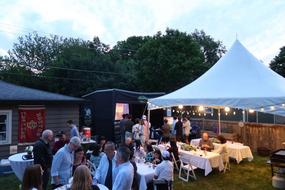 Guests at an outdoor Golf n Go Chicago simulator party near Naperville